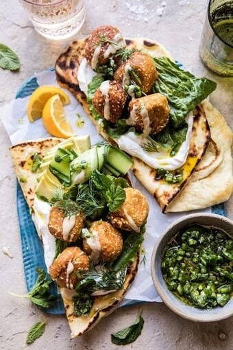 Sesame Falafel with Ginger Tahini and Jalapeño Sauce | halfbakedharvest.com #greek #healthy #recipes