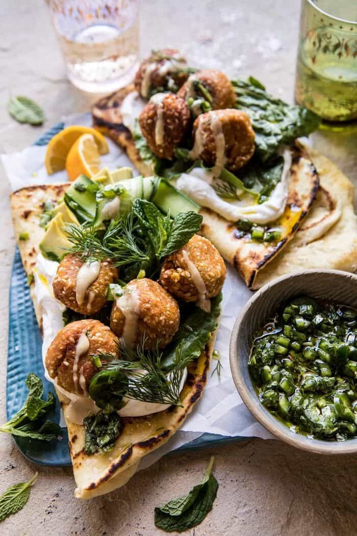 Sesame Falafel with Ginger Tahini and Jalapeño Sauce | halfbakedharvest.com #greek #healthy #recipes