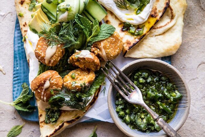 Sesame Falafel with Ginger Tahini and Jalapeño Sauce | halfbakedharvest.com #greek #healthy #recipes