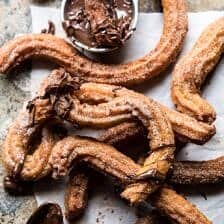 Easy Cinnamon Churros with Coffee Chocolate Sauce | halfbakedharvest.com #mexican #doughnut #dessert #chocolate