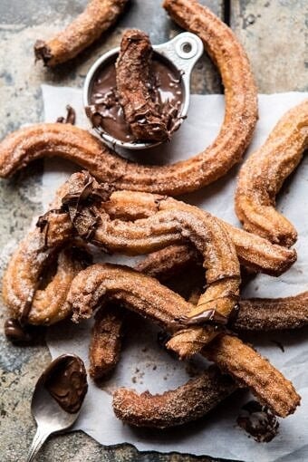 Easy Cinnamon Churros with Coffee Chocolate Sauce | halfbakedharvest.com #mexican #doughnut #dessert #chocolate