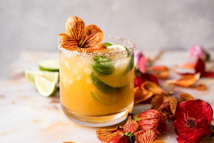 Spicy Gingered Mango Margarita | halfbakedharvest.com #cincodemayo #drinks #mexican