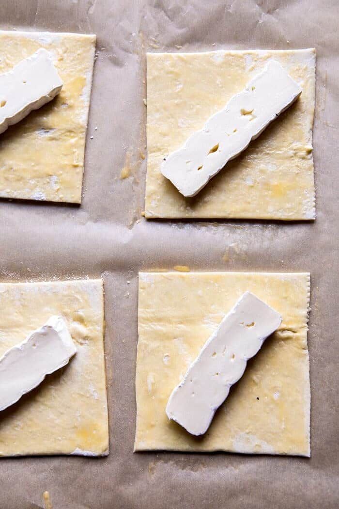 Asparagus and Brie Puff Pastry with Thyme Honey | halfbakedharvest.com #brunch #spring #recipe overhead prep photo of pastry with brie
