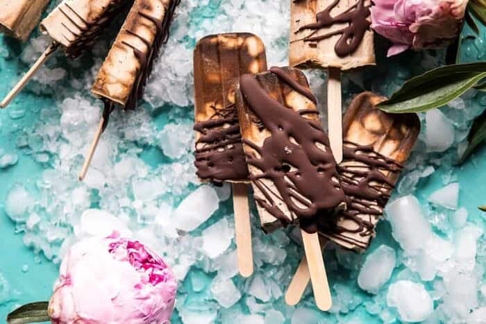 Chocolate Coconut Latte Fudge Popsicles | halfbakedharvest.com #icecream #popsicle #chocolate #healthy overhead horizontal photo of Chocolate Coconut Latte Fudge Popsicles
