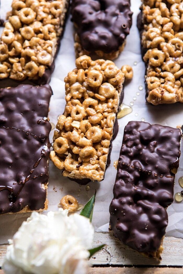 Chocolate Dipped Peanut Butter and Honey Cheerio Bars | halfbakedharvest.com #chocolate #dessert #easyrecipe