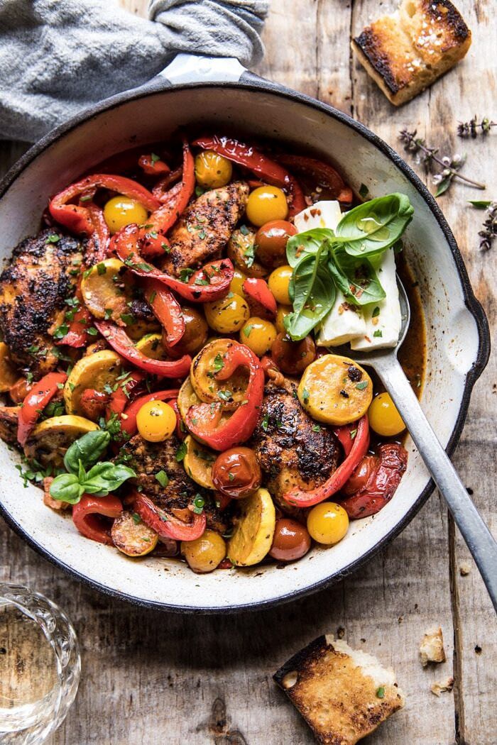 Skillet Lemon Pepper Chicken and Garden Veggies with Feta and Basil | halfbakedharvest.com #chicken #easyrecipes #summer overhead side angle photo of Skillet Lemon Pepper Chicken and Garden Veggies with Feta and Basil