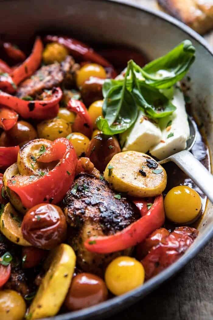 Skillet Lemon Pepper Chicken and Garden Veggies with Feta and Basil | halfbakedharvest.com #chicken #easyrecipes #summer close up detail photo of Skillet Lemon Pepper Chicken and Garden Veggies with Feta and Basil