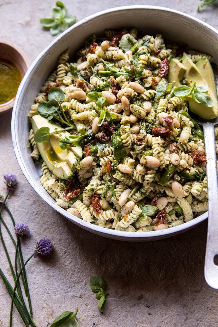 Sun-Dried Tomato, White Bean, and Goat Cheese Pasta Salad | halfbakedharvest.com #quick #healthy #easyrecipes #salad side angle photo of Sun-Dried Tomato, White Bean, and Goat Cheese Pasta Salad