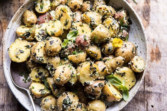 The Best Herby Potato Salad | halfbakedharvest.com #summer #easyrecipe #vegan #potatoes overhead horizontal photo of The Best Herby Potato Salad
