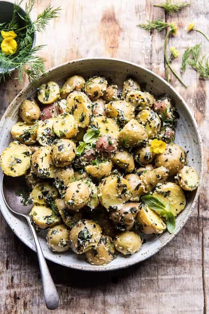 The Best Herby Potato Salad | halfbakedharvest.com #summer #easyrecipe #vegan #potatoes side angle overhead of The Best Herby Potato Salad