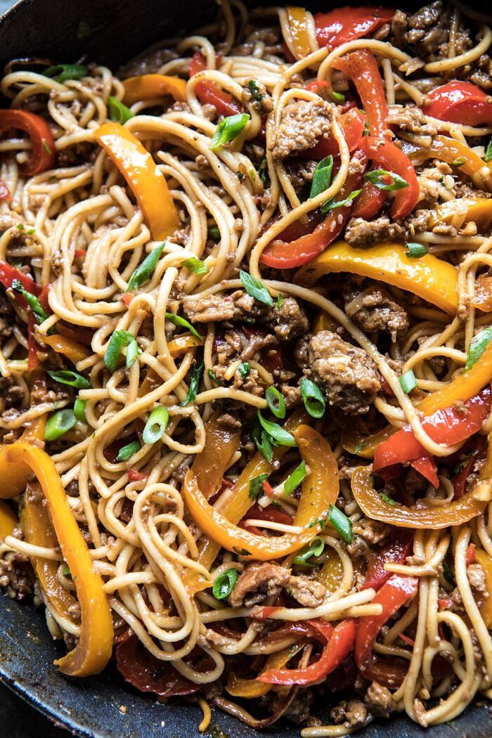 Weeknight 20 Minute Spicy Udon Noodles | halfbakedharvest.com #quick #easy #summerrecipe #healthy close up overhead photo Weeknight 20 Minute Spicy Udon Noodles in skillet