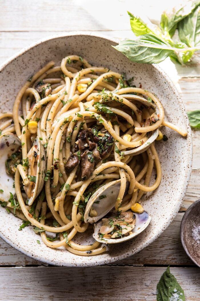 Buttery Mushroom and Clam Pasta | halfbakedharvest.com #pasta #easyrecipe #summerrecipes overhead close up photo of Buttery Mushroom and Clam Pasta