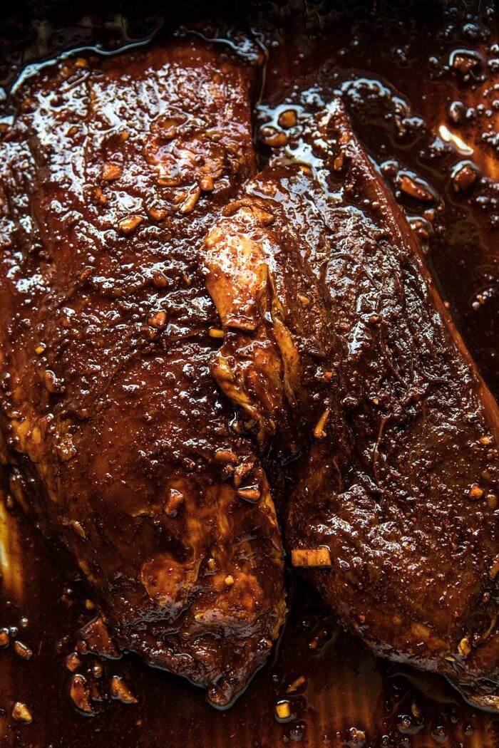 overhead photo of raw steak in marinade 