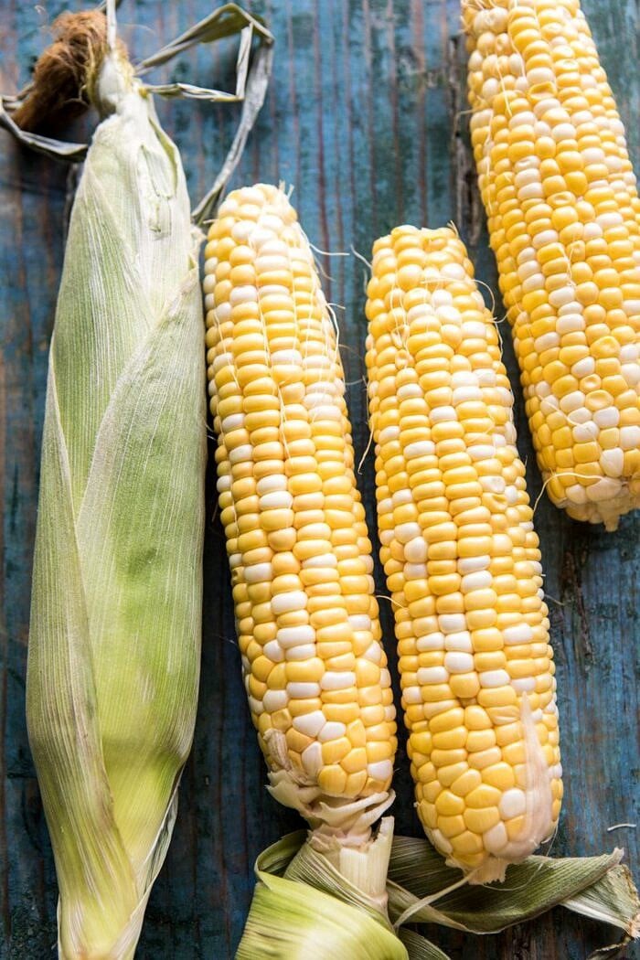 Garlic Butter Creamed Corn Chicken | halfbakedharvest.com #chicken #corn #summer #easy #dinner overhead photo of raw corn