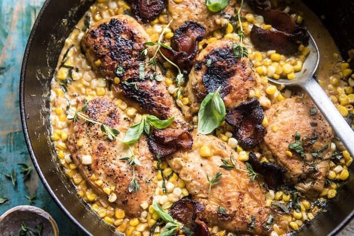 Garlic Butter Creamed Corn Chicken | halfbakedharvest.com #chicken #corn #summer #easy #dinner overhead horizontal photo of Garlic Butter Creamed Corn Chicken