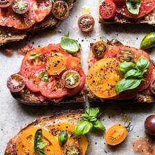 Heirloom Tomato, Basil, and Manchego Toast | halfbakedharvest.com #tomatoes #basil #easyrecipes #summerrecipes