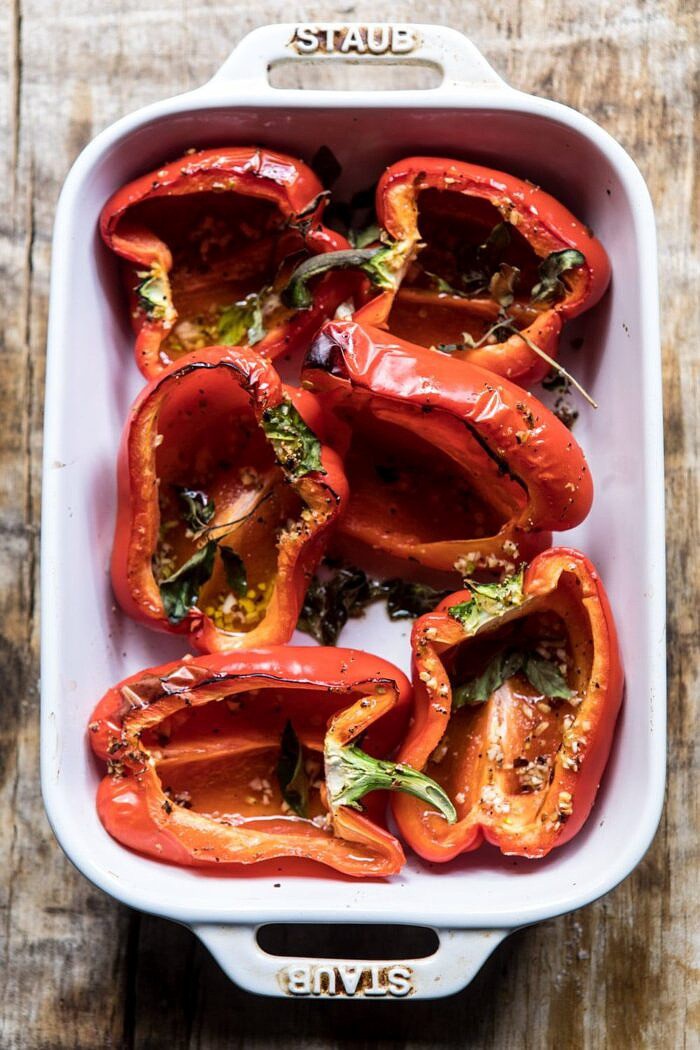 overhead photo of roasted red peppers in baking dish