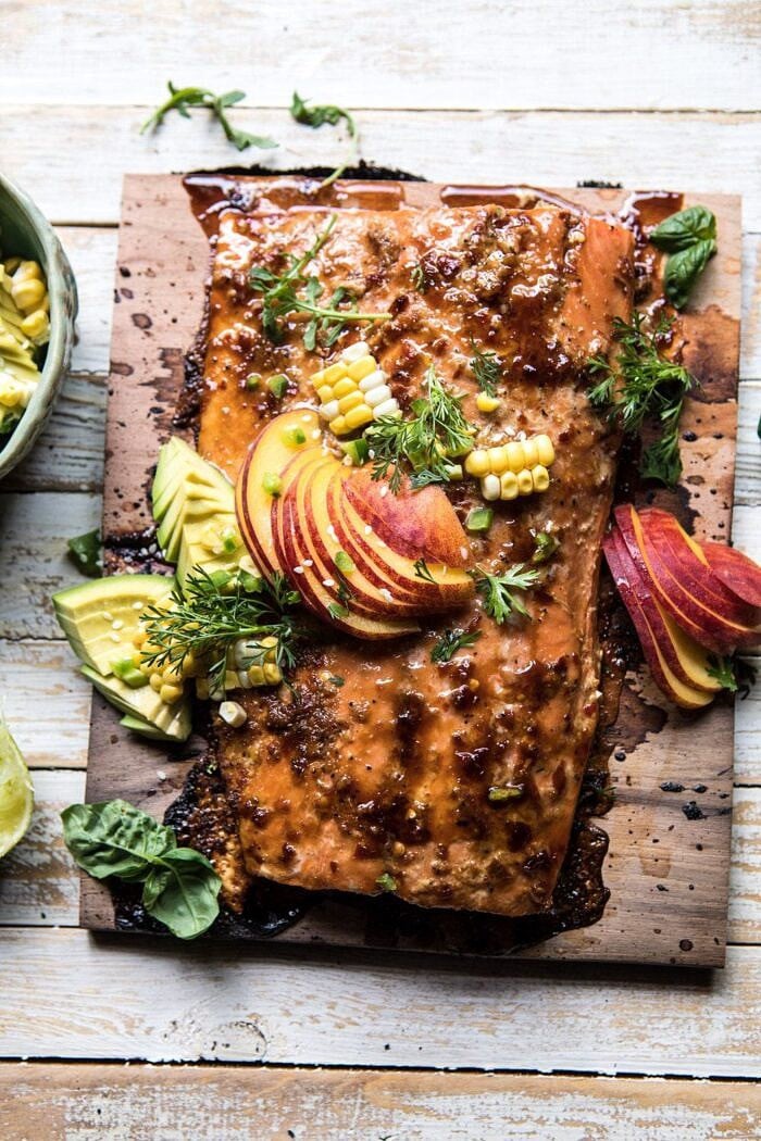overhead photo of Honey Ginger Cedar Plank Grilled Salmon with Avocado Salsa