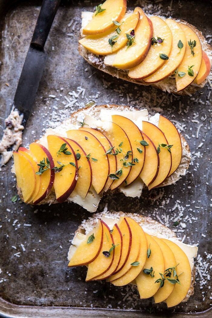 Honey, Peach, and Brie Panini with Bacon Butter | halfbakedhavrest.com #grilledcheese #peaches #easyrecipes #summer overhead close up photo Honey, Peach, and Brie Panini with Bacon Butter without tops of bread before cooking