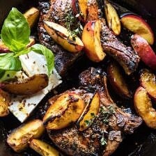Skillet Balsamic Peach Pork Chops with Feta and Basil | halfbakedharvest.com #peaches #porkchops #easydinner #skilletrecipe