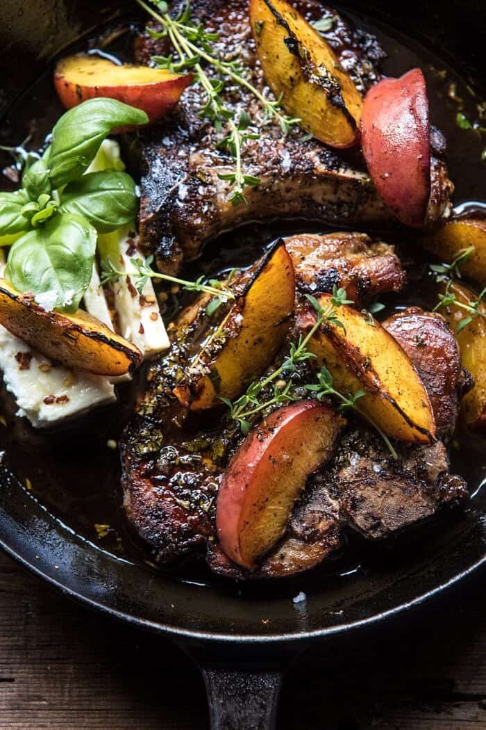 overhead close up photo of Skillet Balsamic Peach Pork Chops with Feta and Basil