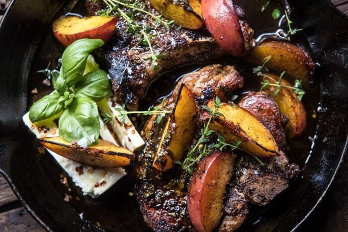 overhead horizontal photo of Skillet Balsamic Peach Pork Chops with Feta and Basil
