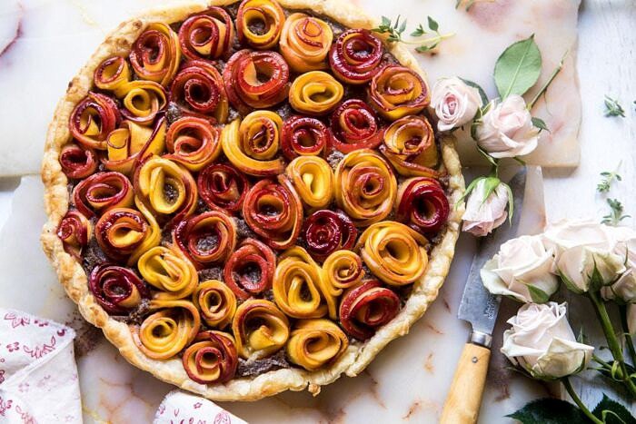 Sweet Peach Rose Tart | halfbakedharvest.com #peach #summerrecipes #tart #summer #pie overhead horizontal photo of Sweet Peach Rose Tart