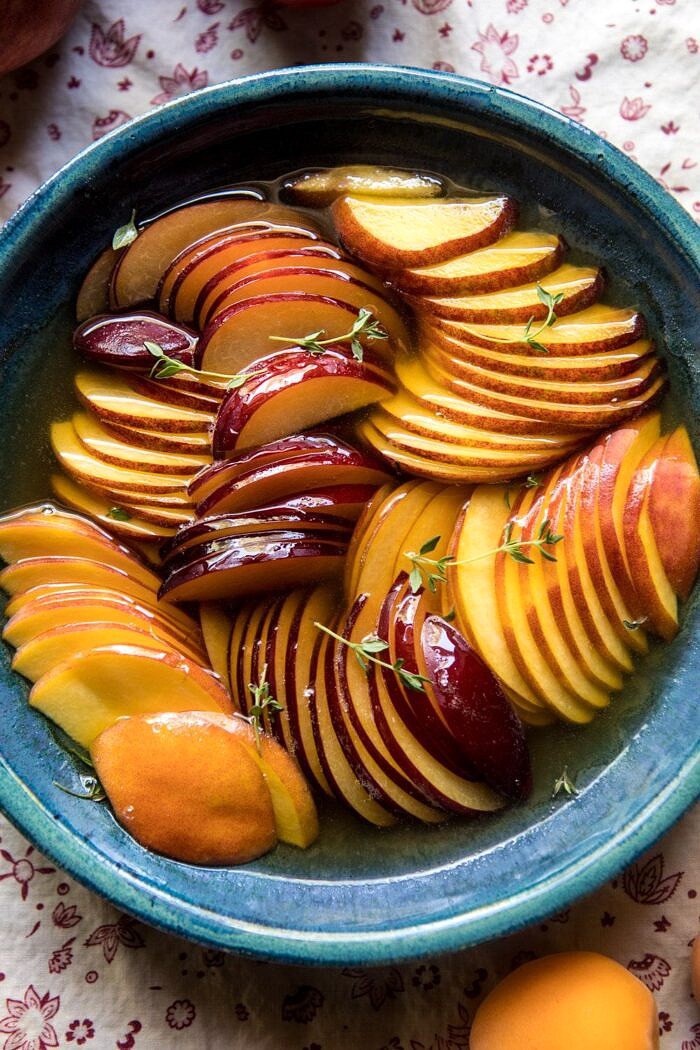 Sweet Peach Rose Tart | halfbakedharvest.com #peach #summerrecipes #tart #summer #pie sliced peaches in honey