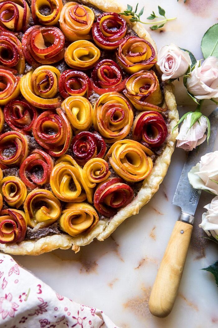 Sweet Peach Rose Tart | halfbakedharvest.com #peach #summerrecipes #tart #summer #pie overhead close up photo of whole Sweet Peach Rose Tart