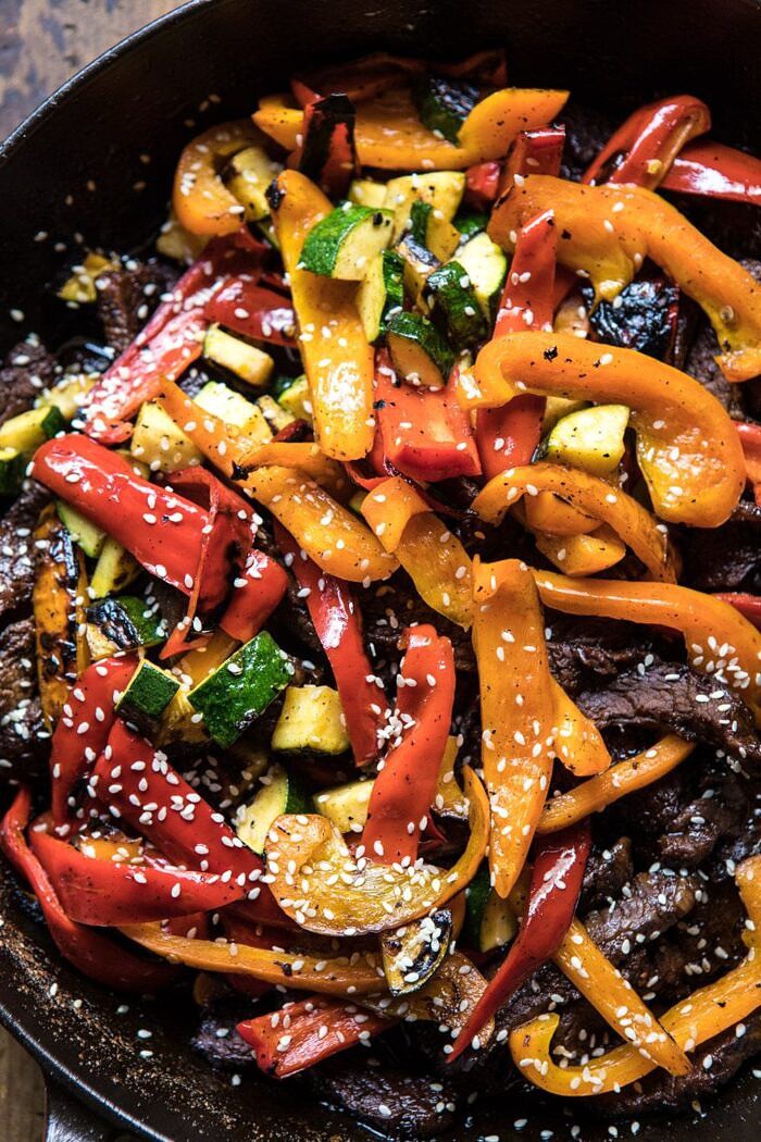 30 Minute Korean Beef and Peppers with Sesame Rice | halfbakedharvest.com #quick #easy #familydinner #korean #steak 30 Minute Korean Beef and Peppers in skillet