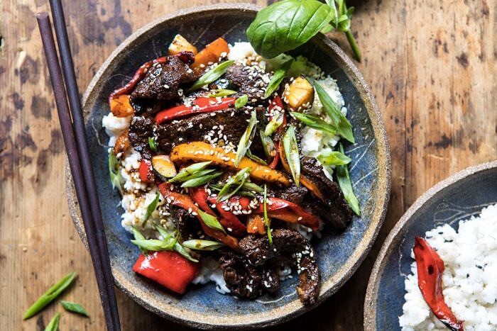 30 Minute Korean Beef and Peppers with Sesame Rice | halfbakedharvest.com #quick #easy #familydinner #korean #steak horizontal photo of 30 Minute Korean Beef and Peppers with Sesame Rice
