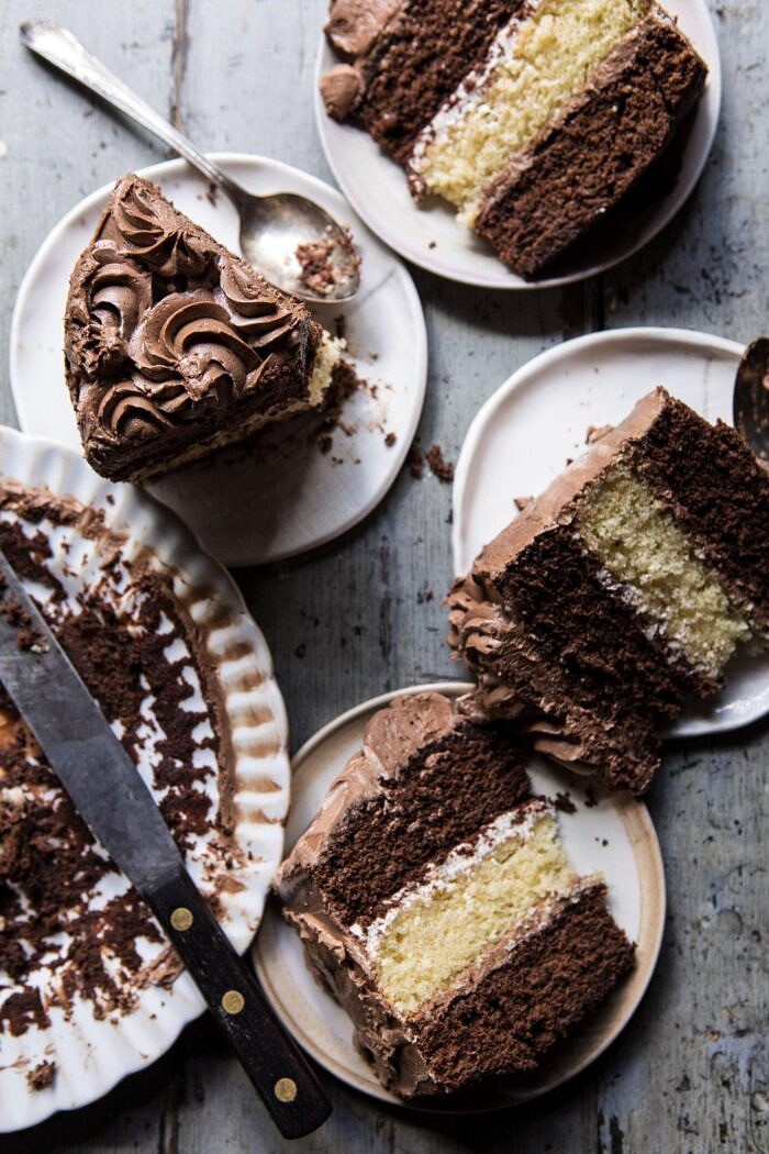 Better Together Chocolate Vanilla Birthday Cake | halfbakedharvest.com #chocolate #cake #birthdaycake #dessert overhead photo of Better Together Chocolate Vanilla Birthday Cake slices