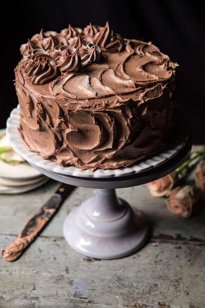 Better Together Chocolate Vanilla Birthday Cake | halfbakedharvest.com #chocolate #cake #birthdaycake #dessert side angle photo of Better Together Chocolate Vanilla Birthday Cake