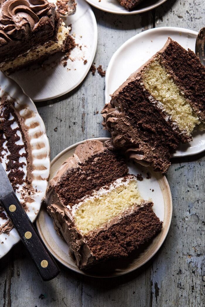 Better Together Chocolate Vanilla Birthday Cake | halfbakedharvest.com #chocolate #cake #birthdaycake #dessert overhead close up photo Better Together Chocolate Vanilla Birthday Cake slices