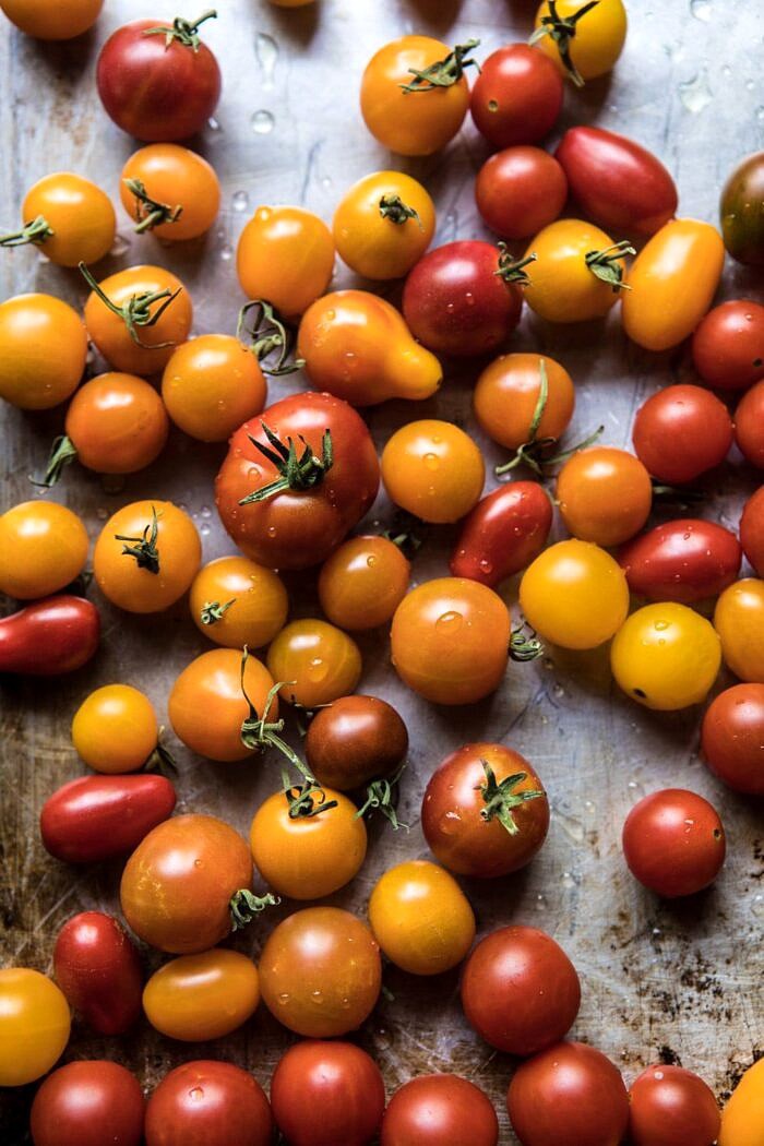 One Pot Tomato Basil Lobster and Herbed Pearl Couscous | halfbakedharvest.com #lobster #tomatoes #easyrecipes #summerrecipes #onepot raw cherry tomatoes