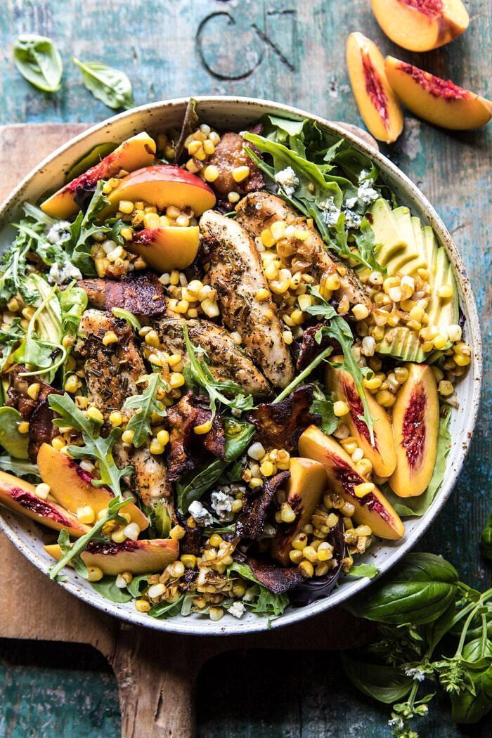 Rosemary Chicken, Caramelized Corn, and Peach Salad with Hot Bacon Vinaigrette | halfbakedharvest.com #salad #chicken #easyrecipes #summer #corn overhead photo of Rosemary Chicken, Caramelized Corn, and Peach Salad with Hot Bacon Vinaigrette with peaches and basil in photo