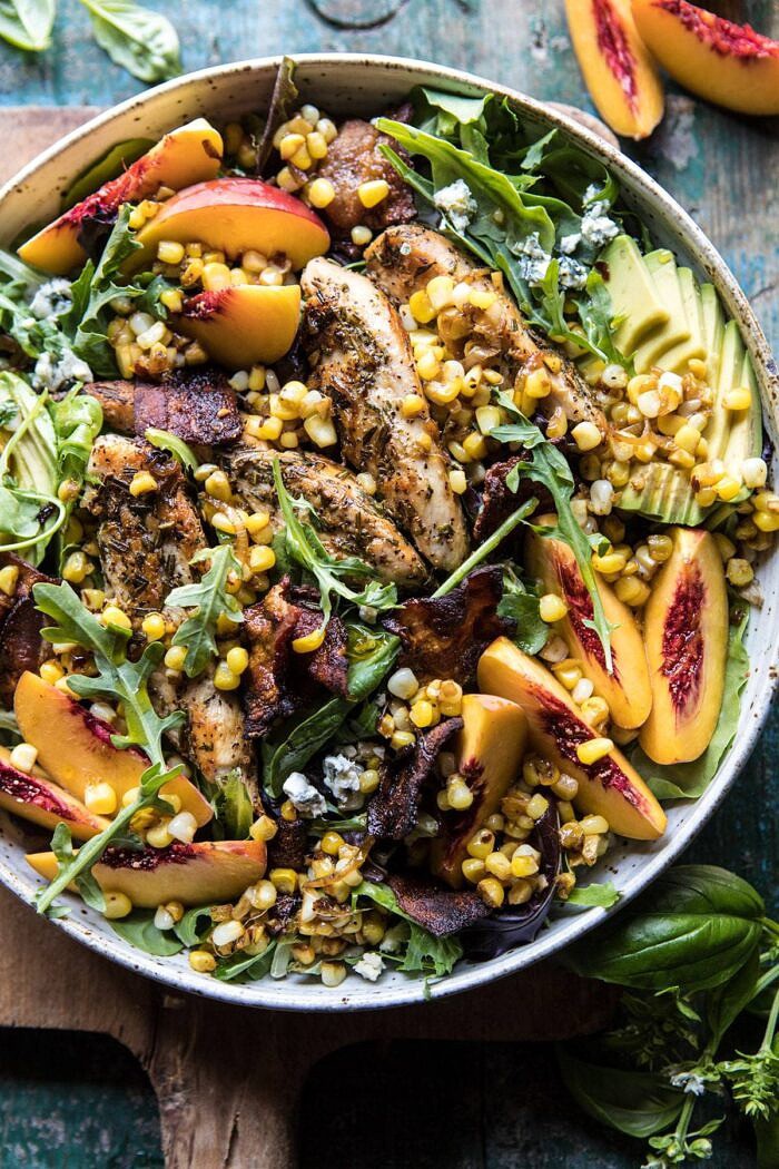 Rosemary Chicken, Caramelized Corn, and Peach Salad with Hot Bacon Vinaigrette | halfbakedharvest.com #salad #chicken #easyrecipes #summer #corn overhead close up photo of Rosemary Chicken, Caramelized Corn, and Peach Salad with Hot Bacon Vinaigrette