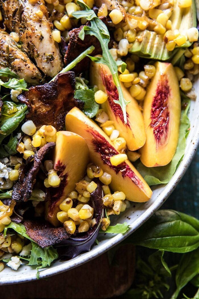Rosemary Chicken, Caramelized Corn, and Peach Salad with Hot Bacon Vinaigrette | halfbakedharvest.com #salad #chicken #easyrecipes #summer #corn close up photo of Rosemary Chicken, Caramelized Corn, and Peach Salad