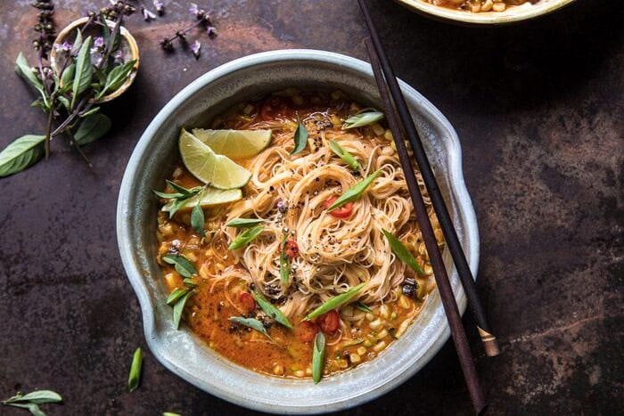 overhead horizontal photo of Saucy Coconut Curry with Rice Noodles and Garden Vegetables