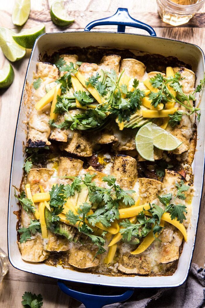 Salsa Verde Chicken and Zucchini Enchiladas with Mango | halfbakedharvest.com #mexican #enchiladas #zucchini #summerrecipes #easy overhead photo of Salsa Verde Chicken and Zucchini Enchiladas with Mango