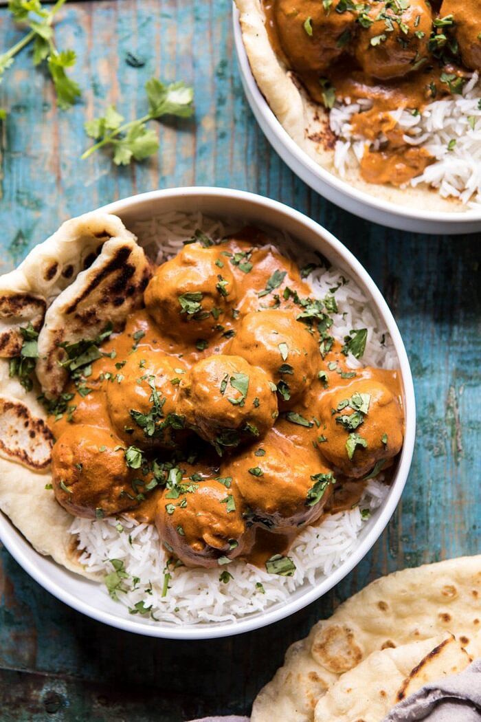 30 Minute Butter Chicken Meatballs | halfbakedharvest.com #meatballs #easyrecipes #Indianrecipes #curry #butterchicken overhead close up photo of 30 Minute Butter Chicken Meatballs