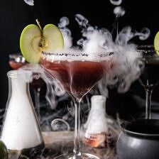 Poison Apple Martini | halfbakedharvest.com #martini #apple #halloween #cocktails
