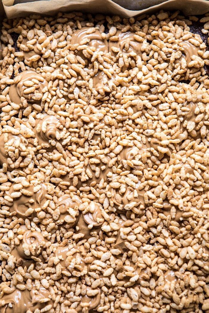 Triple Layer Peanut Butter Crunch Brownies | halfbakedharvest.com #brownies #peanutbutter #chocolate #fallrecipes Triple Layer Peanut Butter Crunch Brownies with crunchy top layer, but before chocolate