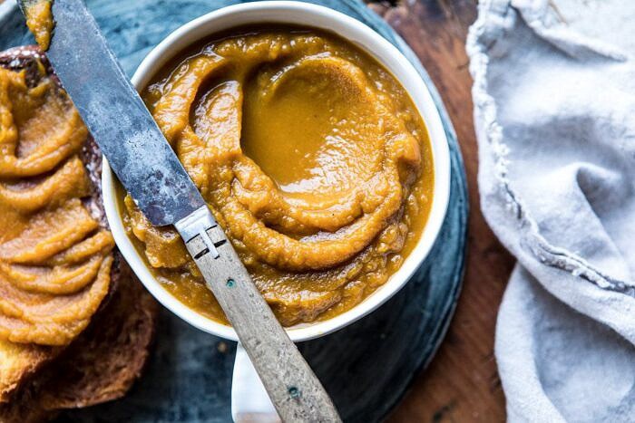 6 Ingredient Spiced Pumpkin Butter | #healthy #pumpkin #fall #autumn #easyrecipes horizontal overhead photo of 6 Ingredient Spiced Pumpkin Butter with butter knife on bowl