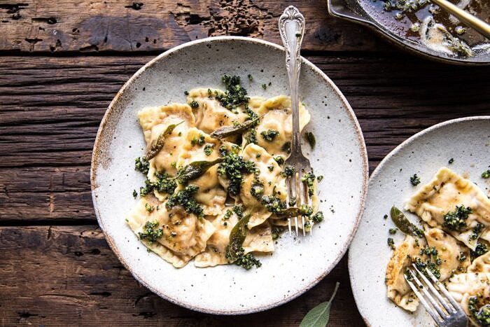Butternut Squash Cheese Ravioli with Browned Butter Sage Pesto | halfbakedharvest.com #pasta #ravioli #fall #autumn #butternutsquash #fallrecipes horizontal photo of Butternut Squash Cheese Ravioli with Browned Butter Sage Pesto
