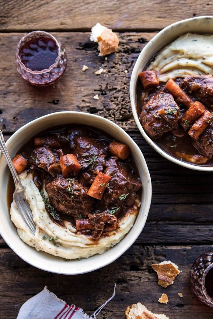 Healthier Instant Pot Coq au Vin | halfbakedharvest.com #instantpot #slowcooker #quick #easy #healthy #fallrecipes #sundaydinner overhead photo of Healthier Instant Pot Coq au Vin with fork in bowl