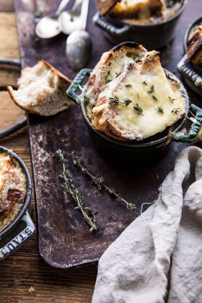 Herby French Shallot Soup | halfbakedharvest.com #french #soup #fallrecipes #cozyrecipes #familyrecipes side angle photo of Herby French Shallot Soup