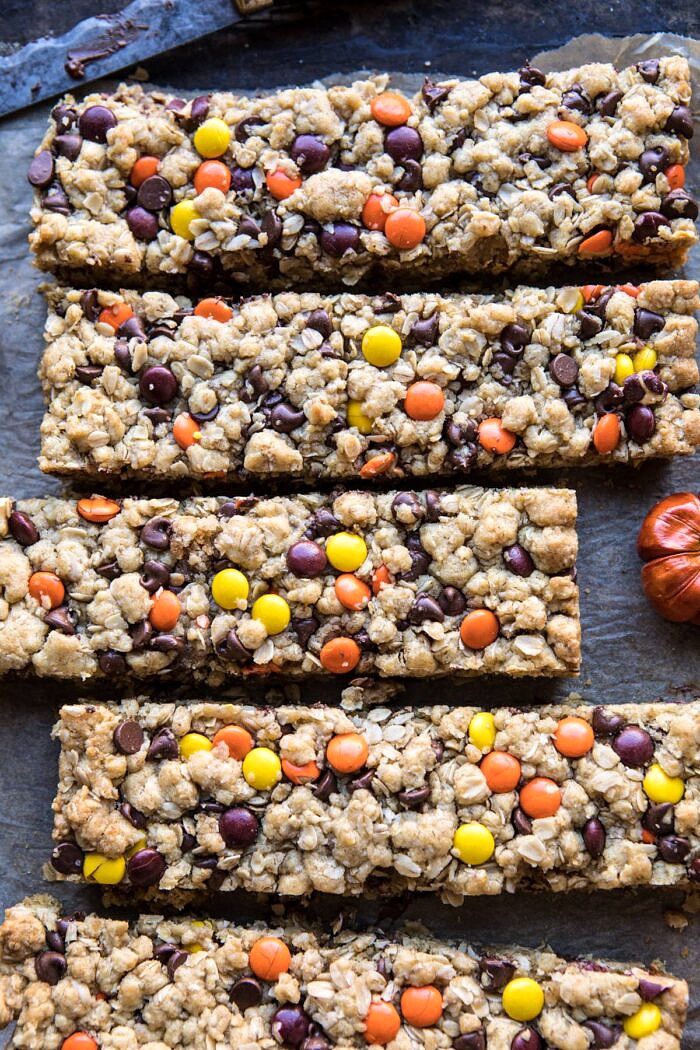 Monster Oatmeal Chocolate Chip Cookie Bars | halfbakedharvest.com #cookies #fall #autumn #halloween #thanksgiving #chocolate #easyrecipes close up photo of Monster Oatmeal Chocolate Chip Cookie Bars