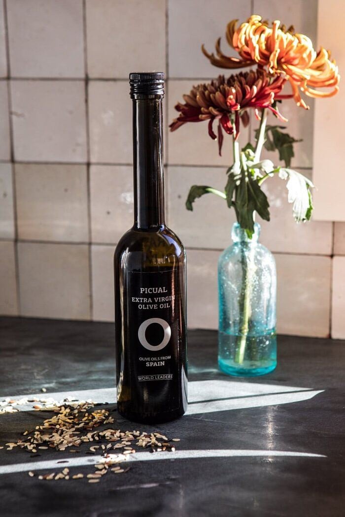 Slow Cooker Herbed Chicken and Rice Pilaf | halfbakedharvest.com #slowcooker #easyrecipes #chicken #wildrice #healthy #fallrecipes photo of olive oil in sunlight