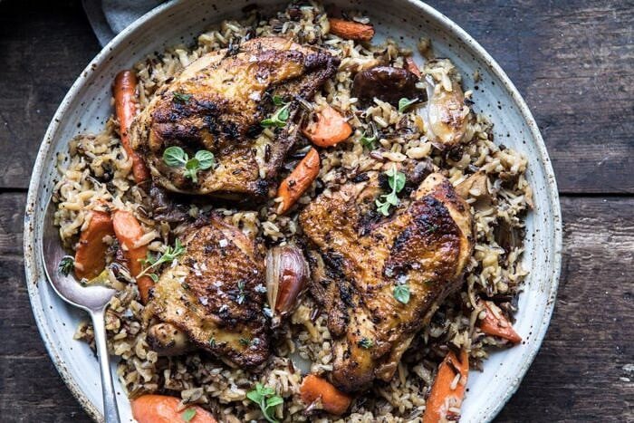 Slow Cooker Herbed Chicken and Rice Pilaf | halfbakedharvest.com #slowcooker #easyrecipes #chicken #wildrice #healthy #fallrecipes overhead horizontal photo of Slow Cooker Herbed Chicken and Rice Pilaf on serving plate